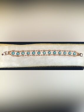 7”L, Evil Eye Rose Gold plated Bracelet with Blue Accents
